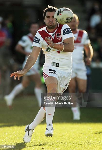 Mathew Head of the Dragons passes the ball out during the round 18 NRL match between the St.George Illawarra Dragons and the South Sydney Rabbitohs...