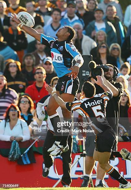 Toshio Laiseni of the Sharks tries to gather a high ball during the round 18 NRL match between the Cronulla Sharks and Wests Tigers played at Toyota...