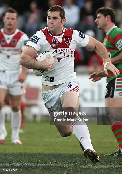 Dean Young of the Dragons takes the ball to line during the round 18 NRL match between the St.George Illawarra Dragons and the South Sydney Rabbitohs...