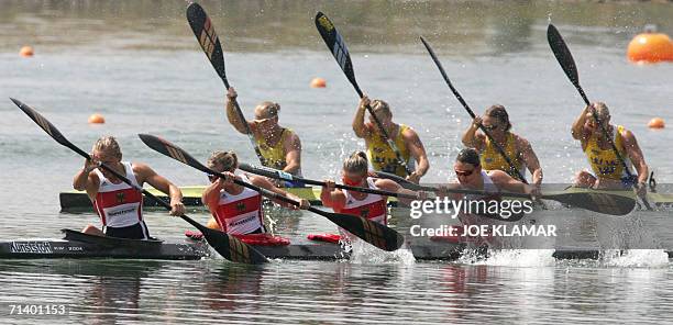 Germans, from left, Carolin Leonhardt, Judith Hoermann, Conny Wassmuth and Gesine Ruge pass the Swedish boat with, from left, Josefin Nordloew, Karin...