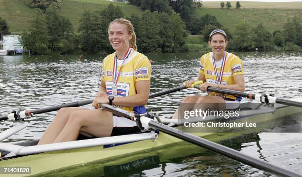 Anna Bebington and Annie Vernon of Great Britain smile after they win Silver and the World Cup Title during the Rowing World Cup III Day 3 on the...