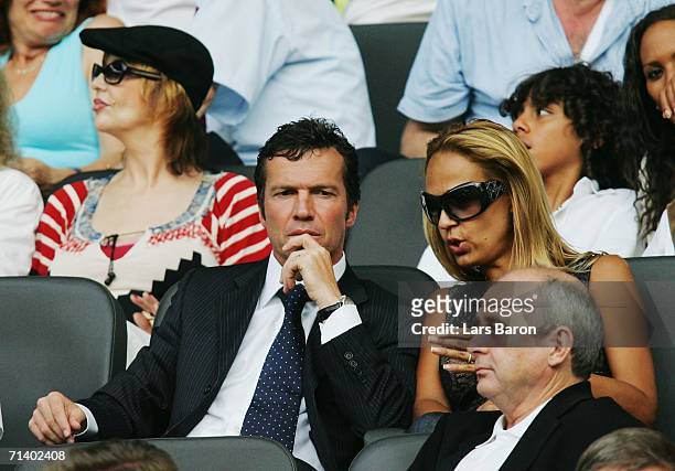 Lothar Matthaus and his wife Marijana look on prior to the FIFA World Cup Germany 2006 Final match between Italy and France at the Olympic Stadium on...