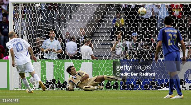 Zinedine Zidane of France scores the opening goal from the penalty spot, past Goalkeeper Gianluigi Buffon of Italy during the FIFA World Cup Germany...