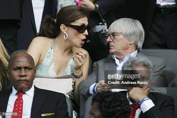 Bernie Ecclestone the Head of Formula One and his wife, Slavica speak during the FIFA World Cup Germany 2006 Final match between Italy and France at...
