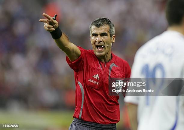 Referee Horacio Elizondo of Argentina gives a decision during the FIFA World Cup Germany 2006 Final match between Italy and France at the Olympic...