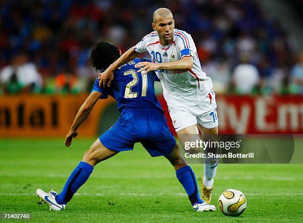 Zinedine Zidane of France is challenged by Andrea Pirlo of Italy during the FIFA World Cup Germany 2006 Final match between Italy and France at the...