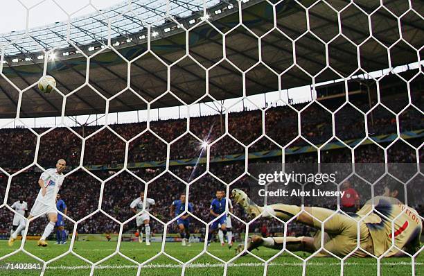 Zinedine Zidane of France scores the opening goal from the penalty spot past Goalkeeper Gianluigi Buffon of Italy during the FIFA World Cup Germany...