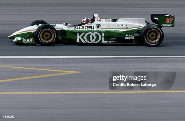 Driver Dario Franchitti of Great Britain who drives the Honda Reynard 2KI for Team KOOL Green is racing during the Target Grand Prix, part of the...