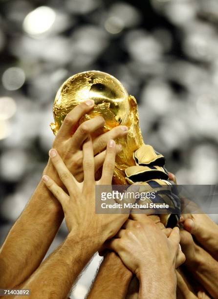 Italian players celebrate with the world cup trophy, following their team's victory during the FIFA World Cup Germany 2006 Final match between Italy...