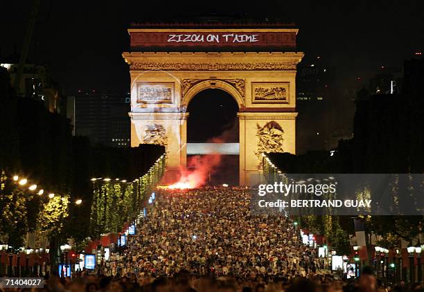Message reading "we love you Zizou [French football star Zinedine Zidane]" is projected on the Arc of Triumph on the Champs Elysee avenue in Paris...