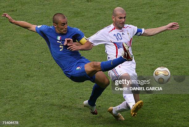 French midfielder Zinedine Zidane fights for the ball with Italian defender Fabio Cannavaro during the World Cup 2006 final football game Italy...