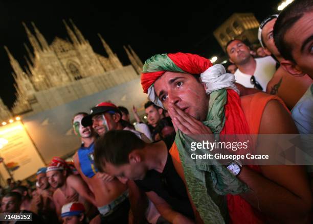 Italian football fans celebrate Italy's victory at the World Cup 2006 finals in "Piazza del Duomo" on July 9, 2006 in Milan, Italy. Italy defeated...