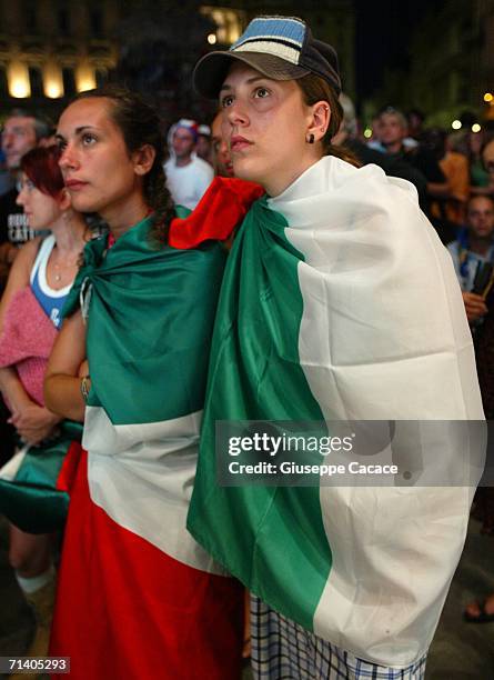 Italian football fans watch the World Cup Final at a public viewing area at the ''Piazza del Duomo'' on July 9, 2006 in MILAN, Italy. Italy defeated...