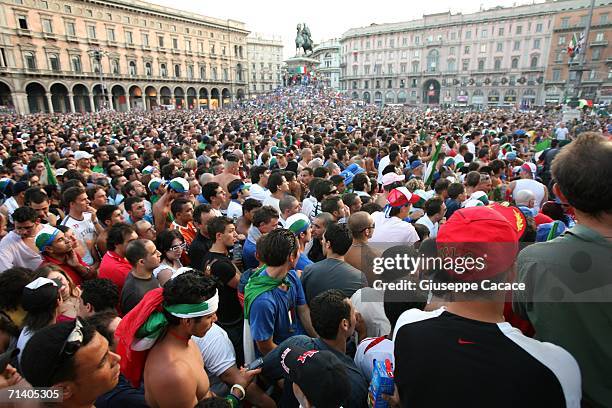 Italian football fans watch the World Cup Final in a public viewing area at the ''Piazza del Duomo'' on July 9, 2006 in Milan, Italy. Italy defeated...