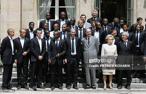 French football team pose with French President Jacques Chirac , his wife Bernadette, Sports Minister Jean-Francois Lamour and Prime Minister...