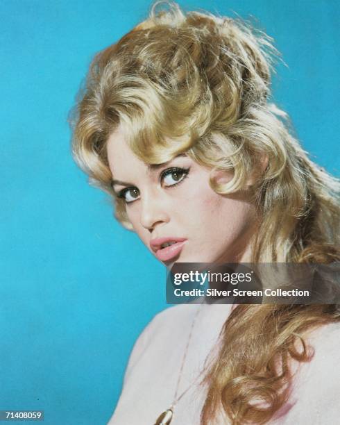 French actress Brigitte Bardot pouts at the camera, circa 1960.