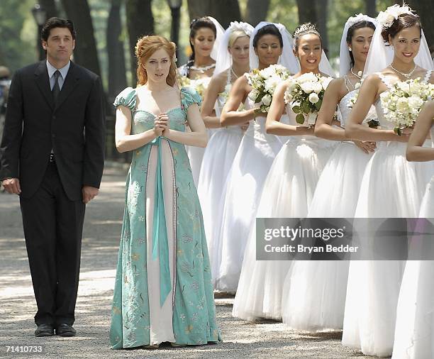 Actors Patrick Dempsey and Amy Adams appear on set during the filming of Walt Disney Pictures "Enchanted" in Central Park on July 10, 2006 in New...