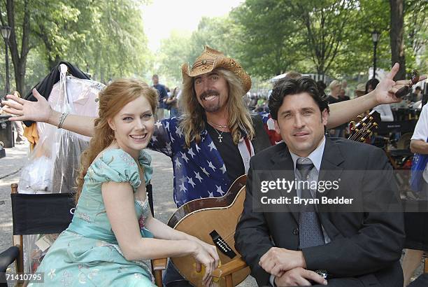 Musician Jeff Watson , actress Amy Adams and actor Patrick Dempsey pose during the filming of Walt Disney Pictures "Enchanted" in Central Park on...