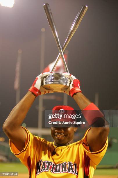 National League All-Star Ryan Howard of the Philadelphia Phillies celebrates with the trophy after winning the CENTURY 21 Home Run Derby at PNC Park...