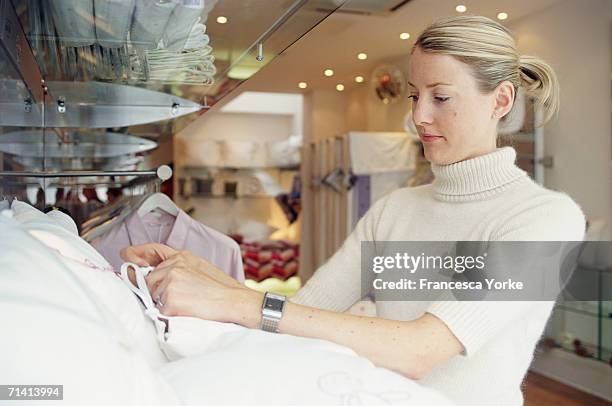 Emily Dyson, daughter of Dyson vacuum cleaner inventor James Dyson, poses at her shop on June 1, 2005 in London.