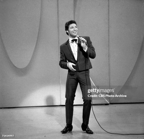 Welsh-born popular singer Tom Jones sings as he wears a short jacket on the Ed Sullivan Show, New York, December 5, 1965.