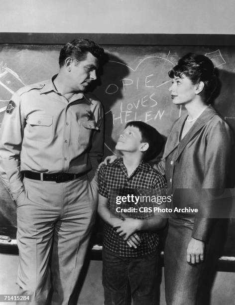 From left to right, Andy Griffith as Sheriff Andy Taylor, Ron Howard as his son Opie Taylor and Aneta Corsaut as Helen Crump in a scene from the...