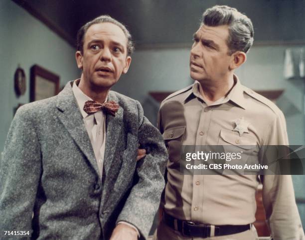 Don Knotts as Deputy Barney Fife and Andy Griffith as Sheriff Andy Taylor in a scene from the television series 'The Andy Griffith Show', circa 1965.