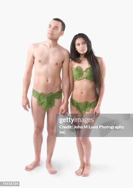 young asian couple wearing underwear made out of leaves - man made object bildbanksfoton och bilder