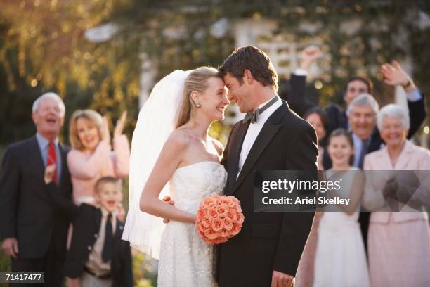 bride and groom smiling at each other - front on groom and bride stock pictures, royalty-free photos & images