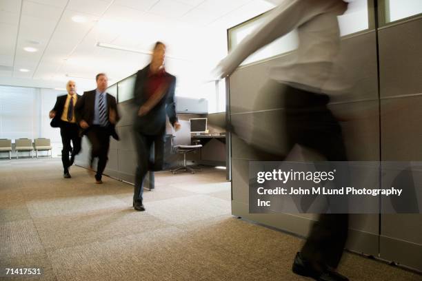 businesspeople running past office cubicles - terrified stock pictures, royalty-free photos & images