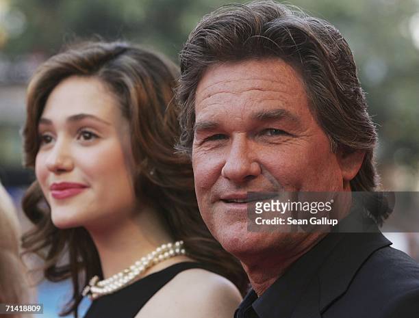 Actor Kurt Russell and actress Emmy Rossum arrive for the German premiere of "Poseidon" July 11, 2006 at the Berlinale Palast in Berlin, Germany.