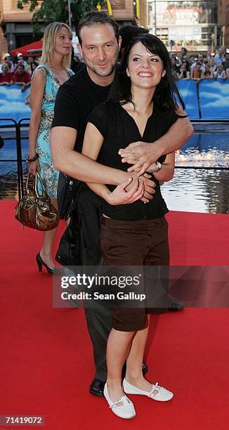 Singer Bjoern Casapietra and his new girlfriend arrive at the German premiere of "Poseidon" July 11, 2006 at the Berlinale Palast in Berlin, Germany.