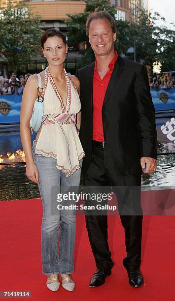 Actor Tom Gerhardt and his wife Katharina Gerhardt arrive at the German premiere of "Poseidon" July 11, 2006 at the Berlinale Palast in Berlin,...