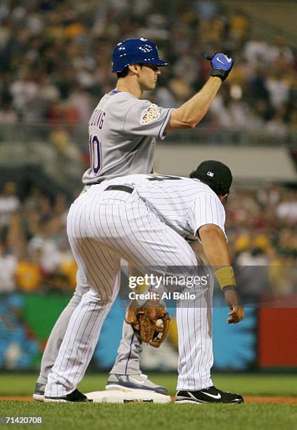 American League All-Star Michael Young of the Texas Rangers celebrates after hitting a game winning two-run triple in the ninth inning against the...