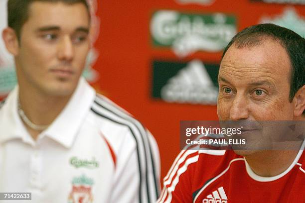 Liverpool, UNITED KINGDOM: Liverpool soccer manager Rafael Benitez welcomes Brazilian left-back Fabio Aurelio to the club, 12 July 2006. Aurelio...