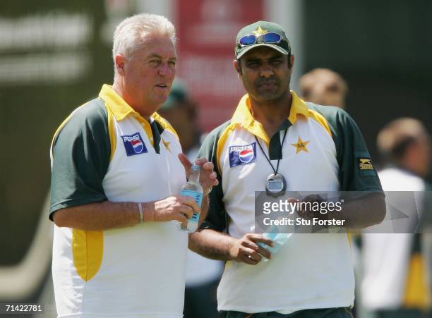 Pakistan coaches Bob Woolmer chats to Waqar Younis during Pakistan nets today ahead of tomorrow's first NPower Test match against England at Lords on...