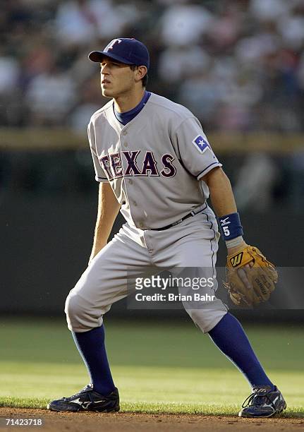 Ian Kinsler of the Texas Rangers gets ready to move during the game against the Colorado Rockies on June 23, 2006 at Coors Field in Denver, Colorado.