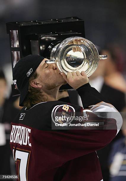 Chris Bourque of the Hershey Bears kisses the Calder Cup after the Hershey Bears defeated the Milwaukee Admirals in game six of the AHL Calder Cup...