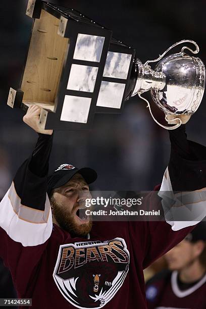 Eric Fehr of the Hershey Bears celebrates with the Calder Cup after the Hershey Bears defeated the Milwaukee Admirals in game six of the AHL Calder...