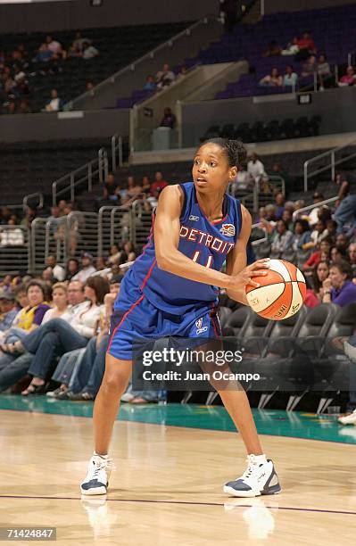 Kedra Holland-Corn of the Detroit Shock looks for an open pass during the game against the Los Angeles Sparks on June 7, 2006 at Staples Center in...