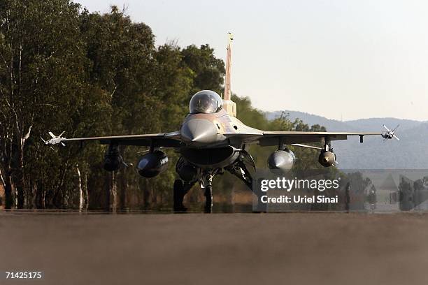 An Israeli F16 warplane, prepares to take off for a mission in Lebanon from Ramat David air force base on July 12 Ramat David, Israel. An assault on...