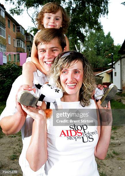 Maxim Anya and Tamila, 35 pose for a photo on August 12, 2005 in Poltava, Ukraine. Both Maxim and Tamila are HIV positive, Anya is HIV negative....