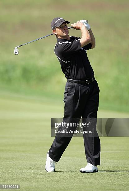 Retief Goosen of South Africa hits an approach shot during the first round of The Barclays Scottish Open at Loch Lomond Golf Club on July 13, 2006 in...