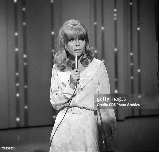 American singer and actress Nancy Sinatra performs on an episode of the CBS Television variety show 'The Ed Sullivan Show,' New York, New York, May...