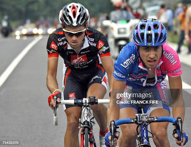 Val-d'Aran-Pla-de-Beret, SPAIN: Spain's David Arroyo Duran and Italy's Damiano Cunego ride during their breakaway in the 206.5 km eleventh stage of...