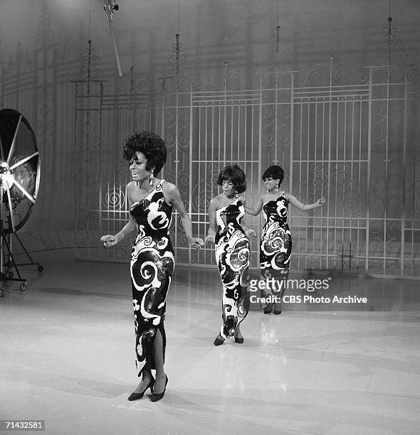 Front to back, American singers Diana Ross, Cindy Birdsong, and Mary Wilson from the Motown soul pop group The Supremes perform on an episode of the...