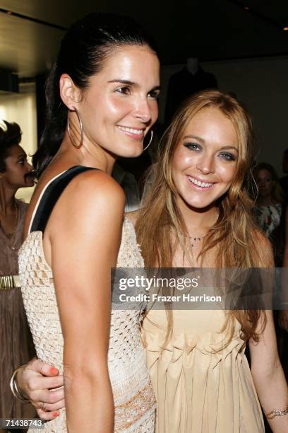 Actresses Angie Harmon and Lindsay Lohan attend the opening of "Waist Down - Skirts By Miuccia Prada" held at Prada on July 13, 2006 in Beverly...