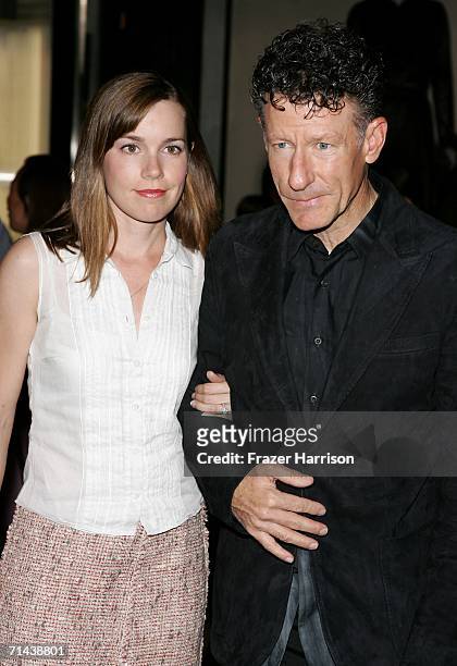 Musician Lyle Lovett and April Kimble arrive at the opening of "Waist Down - Skirts By Miuccia Prada" held at Prada on July 13, 2006 in Beverly...