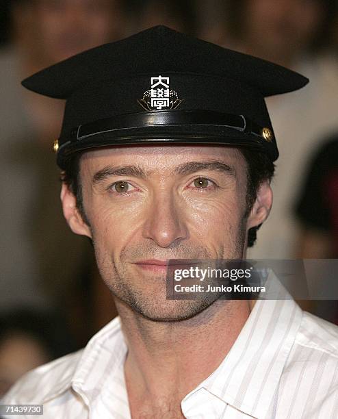 Actor Hugh Jackman poses for photographers during the premiere of the movie "X-Men: The Last Stand" at Waseda University on July 14, 2006 in Tokyo,...