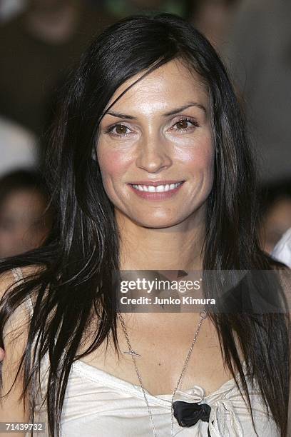 Actress Famke Janssen poses for photographers during the premiere of the movie "X-Men: The Last Stand" at Waseda University on July 14, 2006 in...